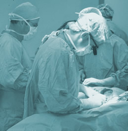 Strong Health plastic surgeon performing a breast surgery procedure.
